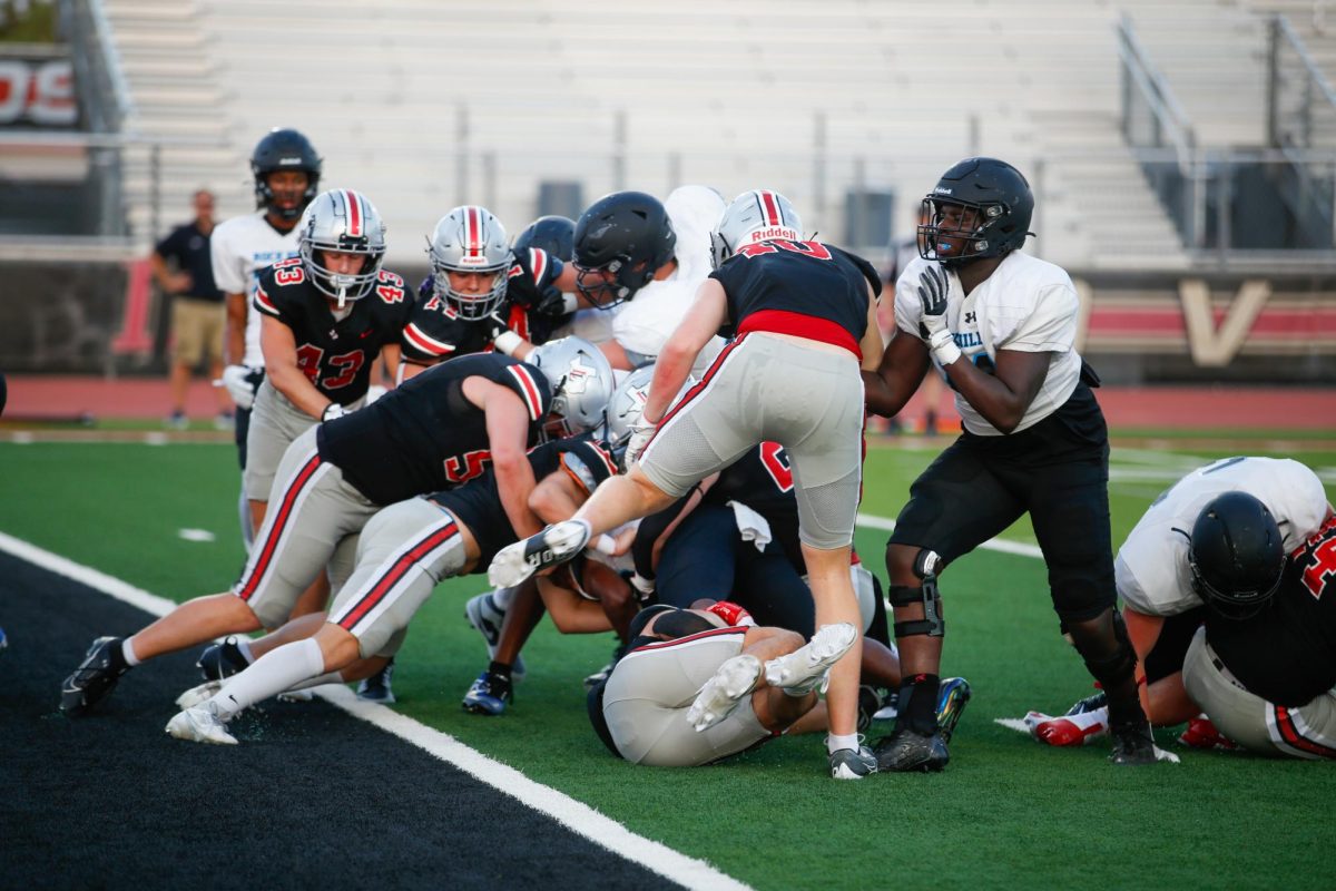 The Lovejoy defensive line defends the end zone. The team is ranked 22nd in the state.