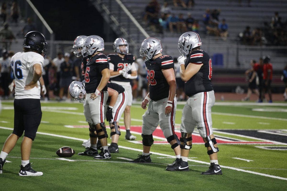 The Lovejoy offensive line prepares to start a play. Lovejoy is in a new district this year.