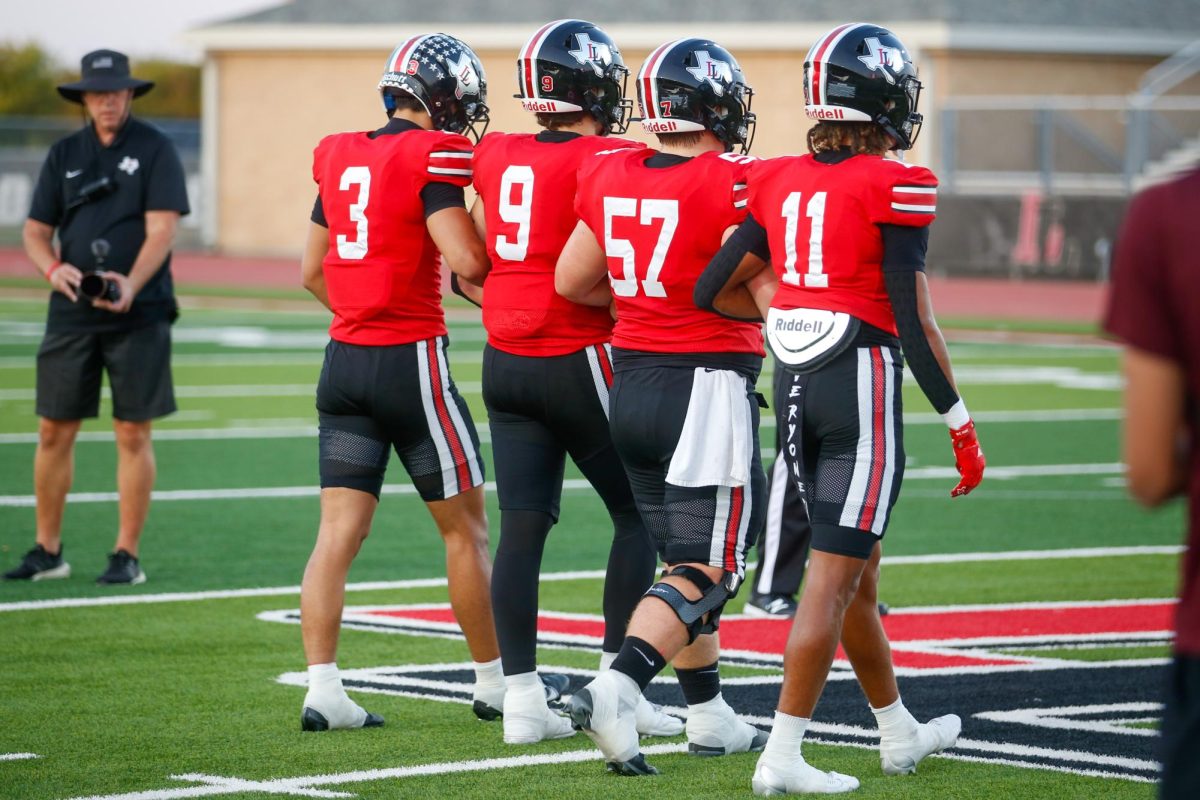 Senior Captains walk onto the field for the coin toss. Captains for this game were RJ McIntosh, Gavin Prince, Brody Mcknight, and Daylan McCutcheon.