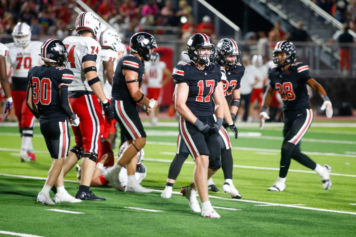 Senior linebacker no. 17 Kevin Magee celebrates a tackle. Kevin averages 10.2 tackles a game.