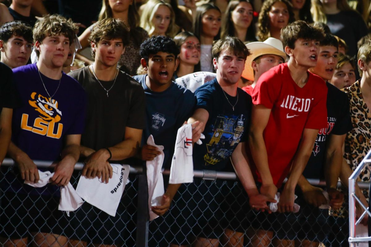 Senior Luke Armstrong yells at the referee. Lovejoy and are self declared rival schools.