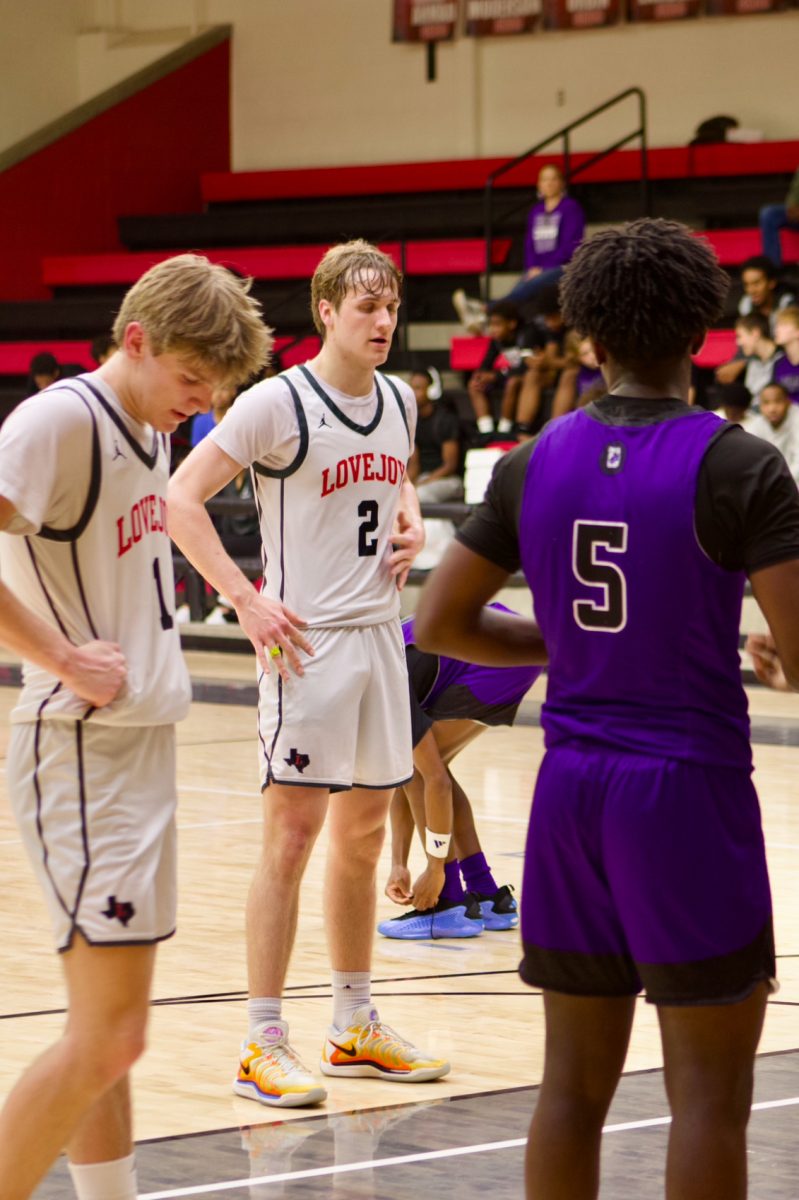 Junior forward no. 2 Maddox Johnson lines up for a free throw. Lovejoy is ranked first in the district.