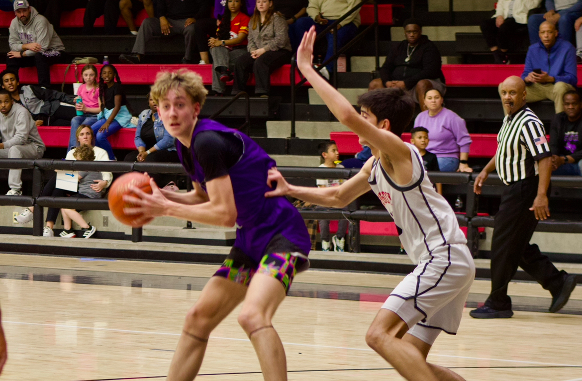 Senior guard no. 10 Pierce Patel defends an Anna player. Lovejoy plays again at Denison High School next Tuesday.