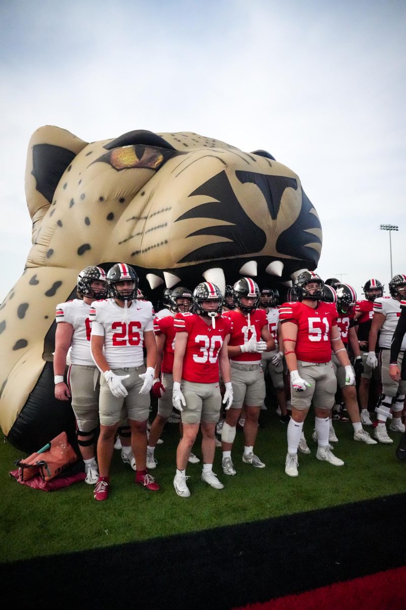 The lovejoy football team preparing for their ¨spring ball¨ game where they compete against each other.