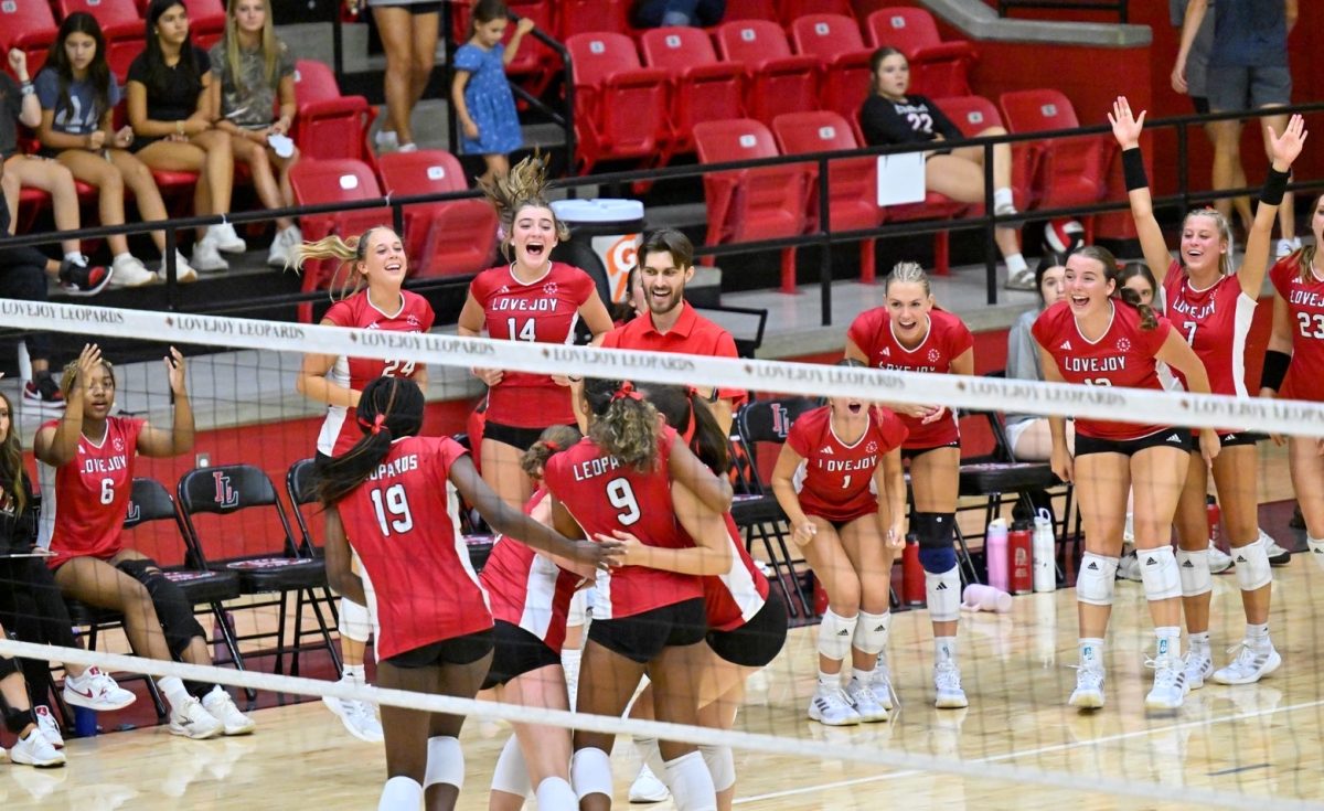 The girls volleyball team after securing a point.
